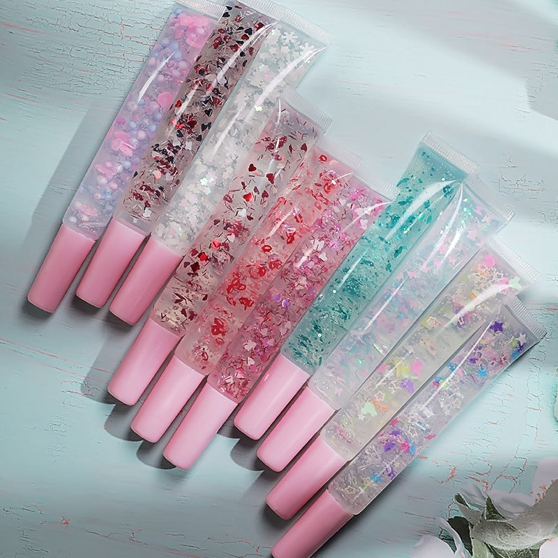 [ Your Private Label ] Vegan Clear Pink Glossy Plumping Shimmer Lip Gloss Base with flower Squeeze Tube