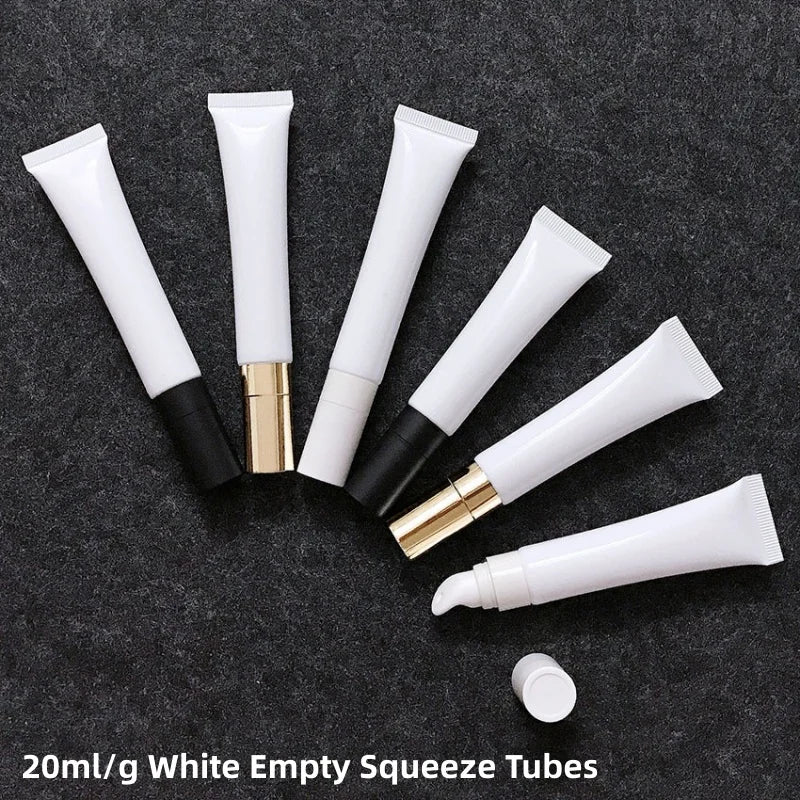 Empty cosmetic tube with zinc alloy applicator