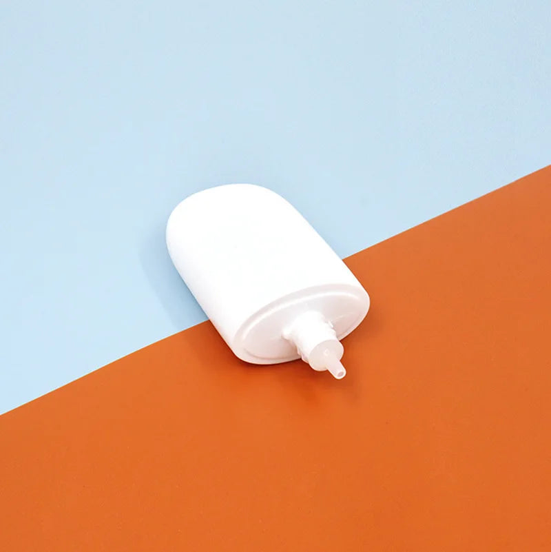white silver lotion bottle liquid plastic container empty sun cream bottle