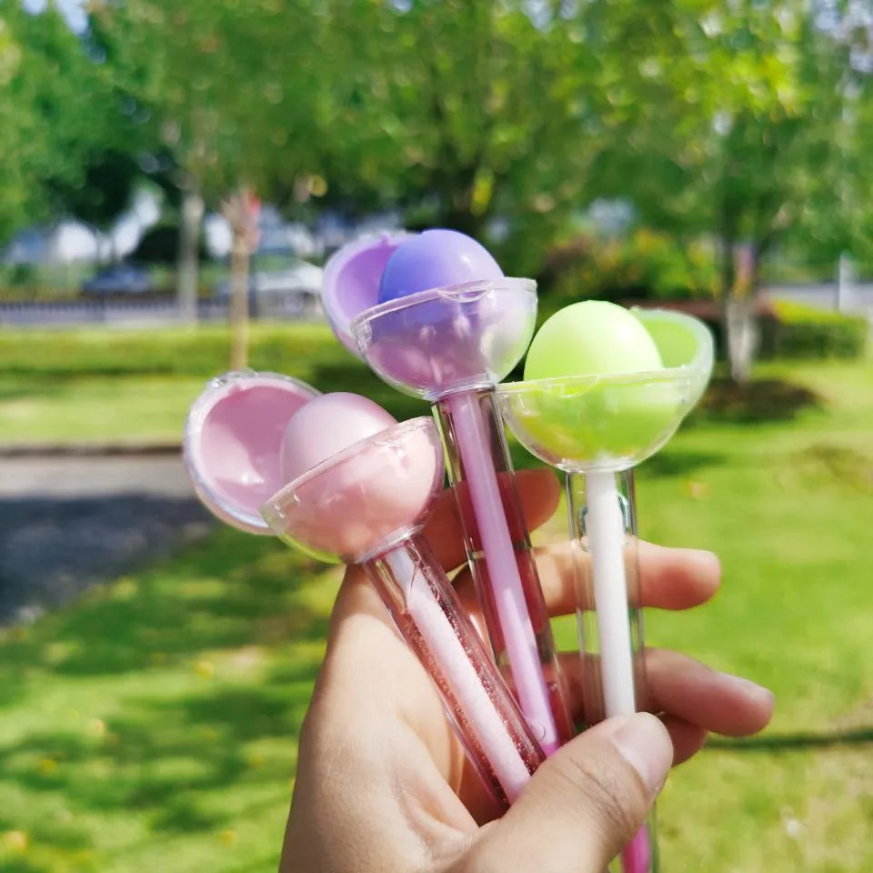 lip care products magic color hydrating tinted clear color changing lip oil 2-in-1 pink lollipop round ball chapstick li