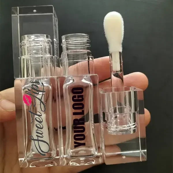 Empty clear square lip gloss container with big doe foot applicator