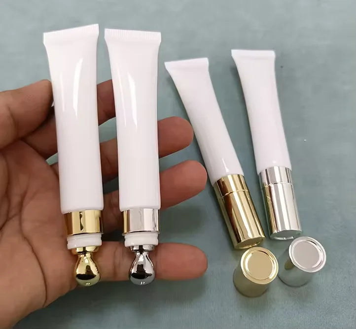 Empty plastic lip gloss squeeze tubes with applicators