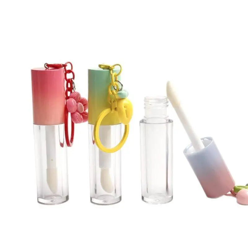 hot selling multi-color lid round tube cosmetics container plastic cute empty lip oil lipstick tube with keychain