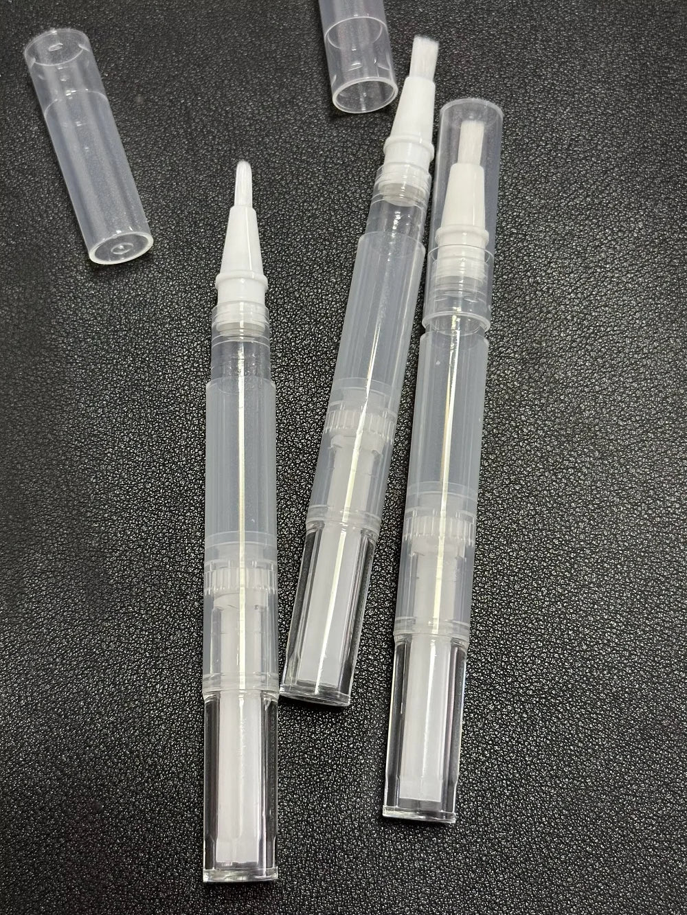 Empty cuticle oil twist pen with brush for nail and lip care