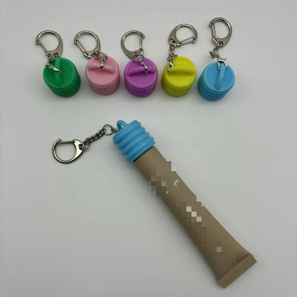 new arrival keychain lipgloss tube holder 5 colors lip gloss silicone keychain caps