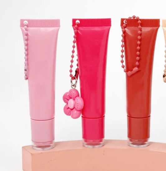 Empty plastic squeeze lip balm tubes