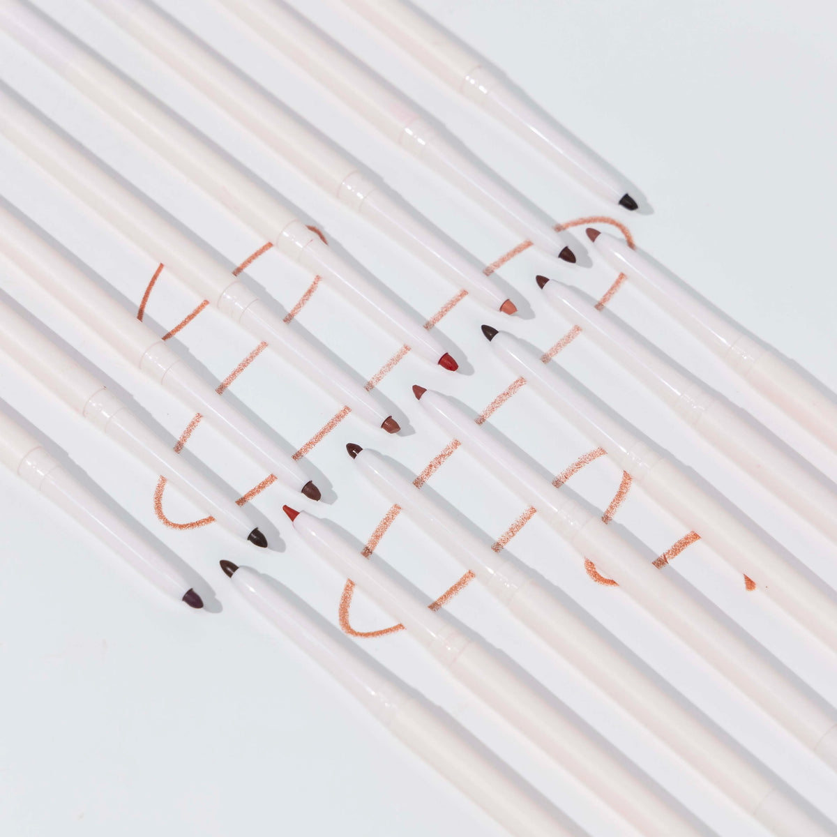 Retractable lip liner with sharpener