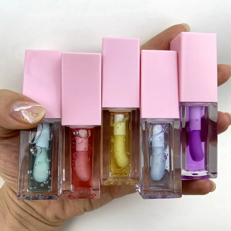 Wholesale Tinted  Lip Plumper Oil Lip Oils Moisturizing Fruit Flavor Lip Oil Private Label Color Changing Magic Lipoil